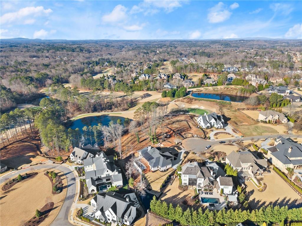 5071 Kings Cl Alpharetta, GA 30004 - Photo 39 of 53 an aerial view of residential building with parking space