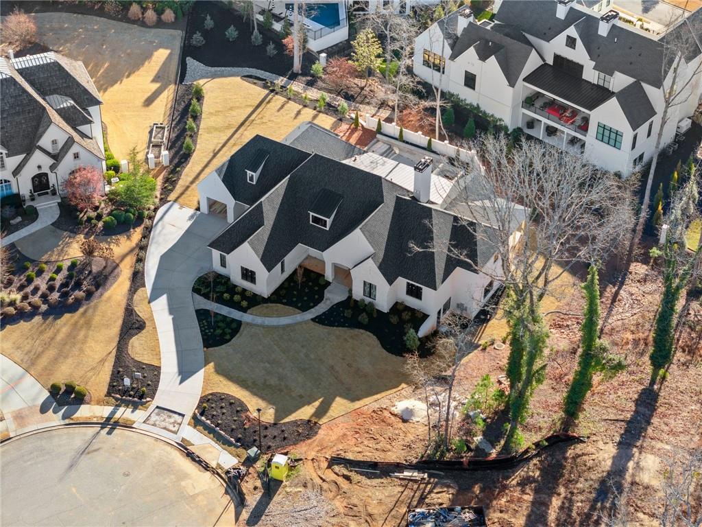 5071 Kings Cl Alpharetta, GA 30004 - Photo 41 of 53 an aerial view of a house with a yard and parking