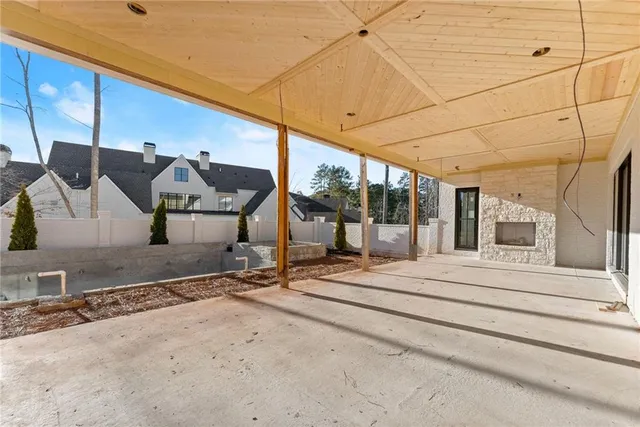a view of a building with sitting area