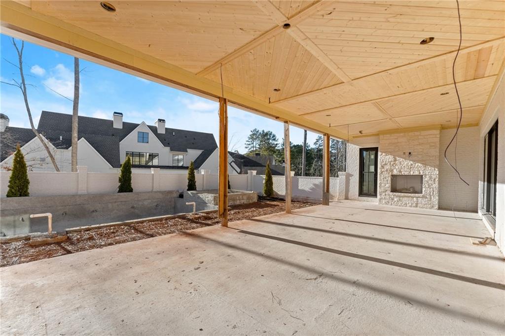 5071 Kings Cl Alpharetta, GA 30004 - Photo 9 of 53 a view of a building with sitting area