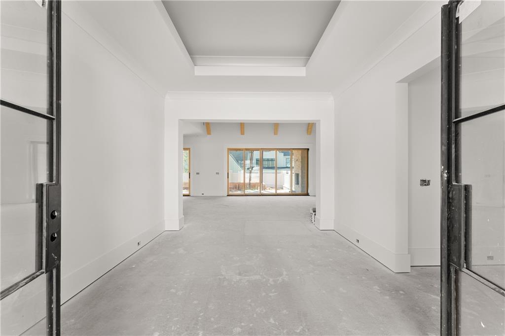 5071 Kings Cl Alpharetta, GA 30004 - Photo 10 of 53 a view of an empty room with a window