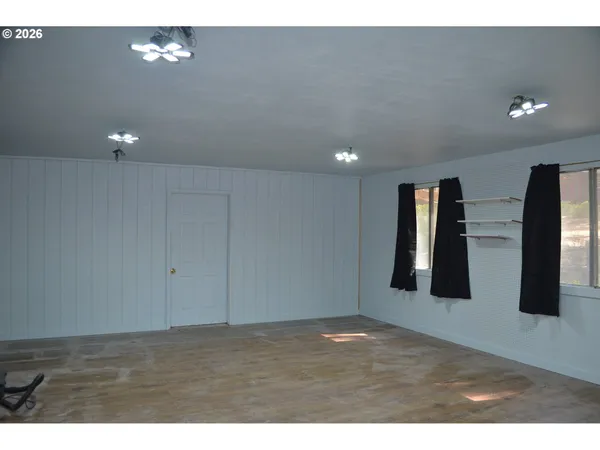 a view of outdoor space and wooden floor