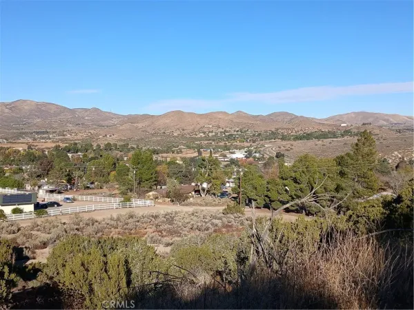 a view of mountain view with mountains in the background