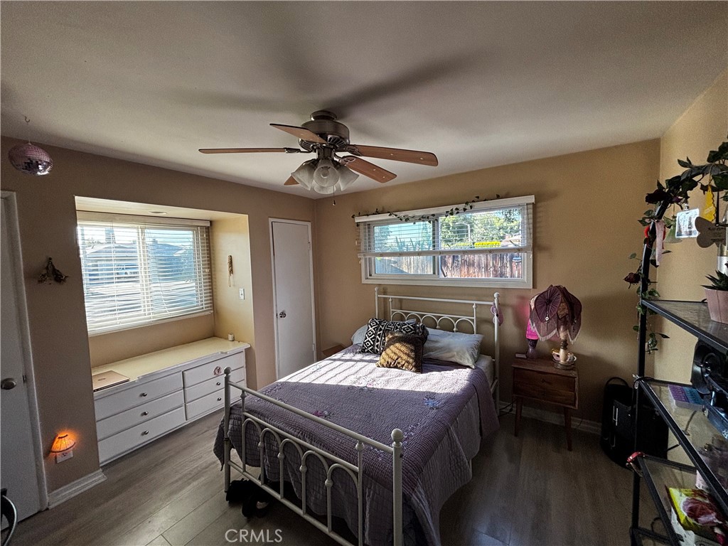 5604 Tower Road Riverside, CA 92506 - Photo 24 of 54 a bedroom with a bed and a flat tv screen on the dresser