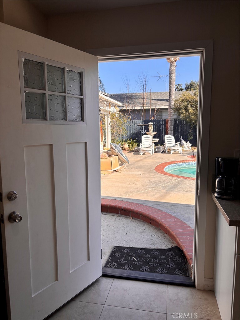 5604 Tower Road Riverside, CA 92506 - Photo 39 of 54 a view of swimming pool from a living room