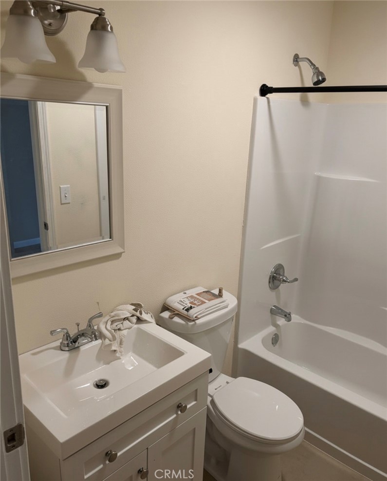 5604 Tower Road Riverside, CA 92506 - Photo 49 of 54 a bathroom with a sink toilet and shower