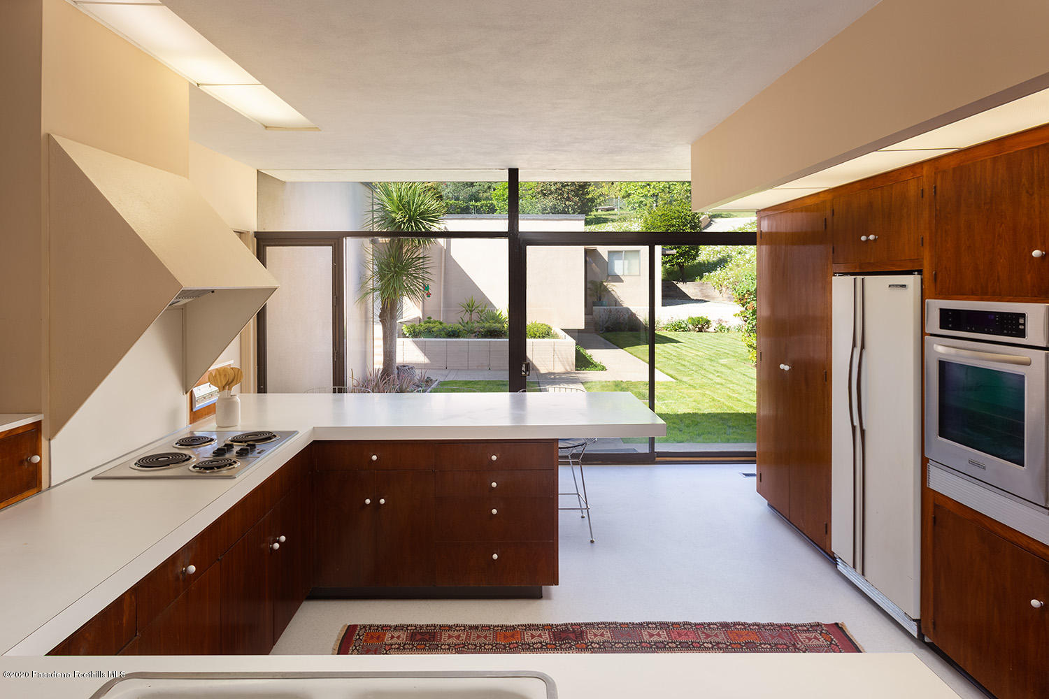 2105 Villa Heights Road Pasadena, CA 91107 - Photo 16 of 45 a open kitchen with stainless steel appliances granite countertop a sink and a stove