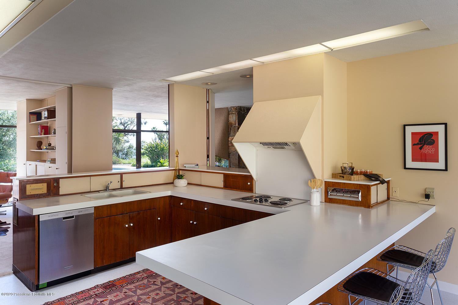 2105 Villa Heights Road Pasadena, CA 91107 - Photo 17 of 45 a kitchen with a sink a stove and a microwave
