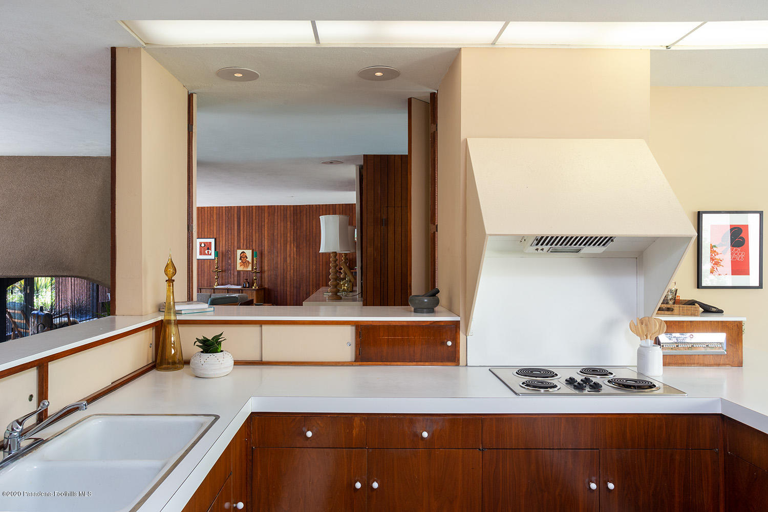 2105 Villa Heights Road Pasadena, CA 91107 - Photo 18 of 45 a kitchen with kitchen island a sink appliances and cabinets