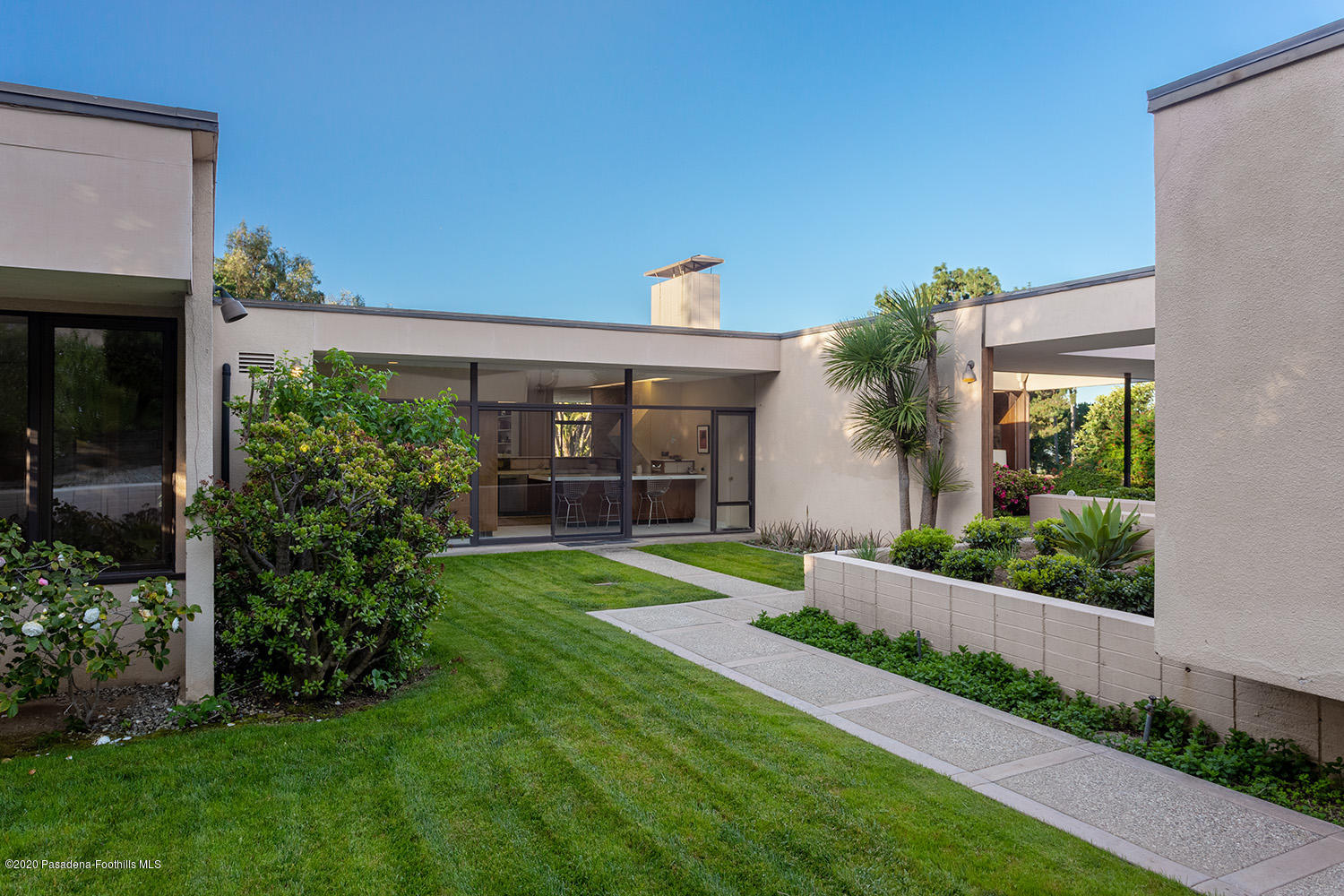 2105 Villa Heights Road Pasadena, CA 91107 - Photo 22 of 45 a front view of a house with a yard