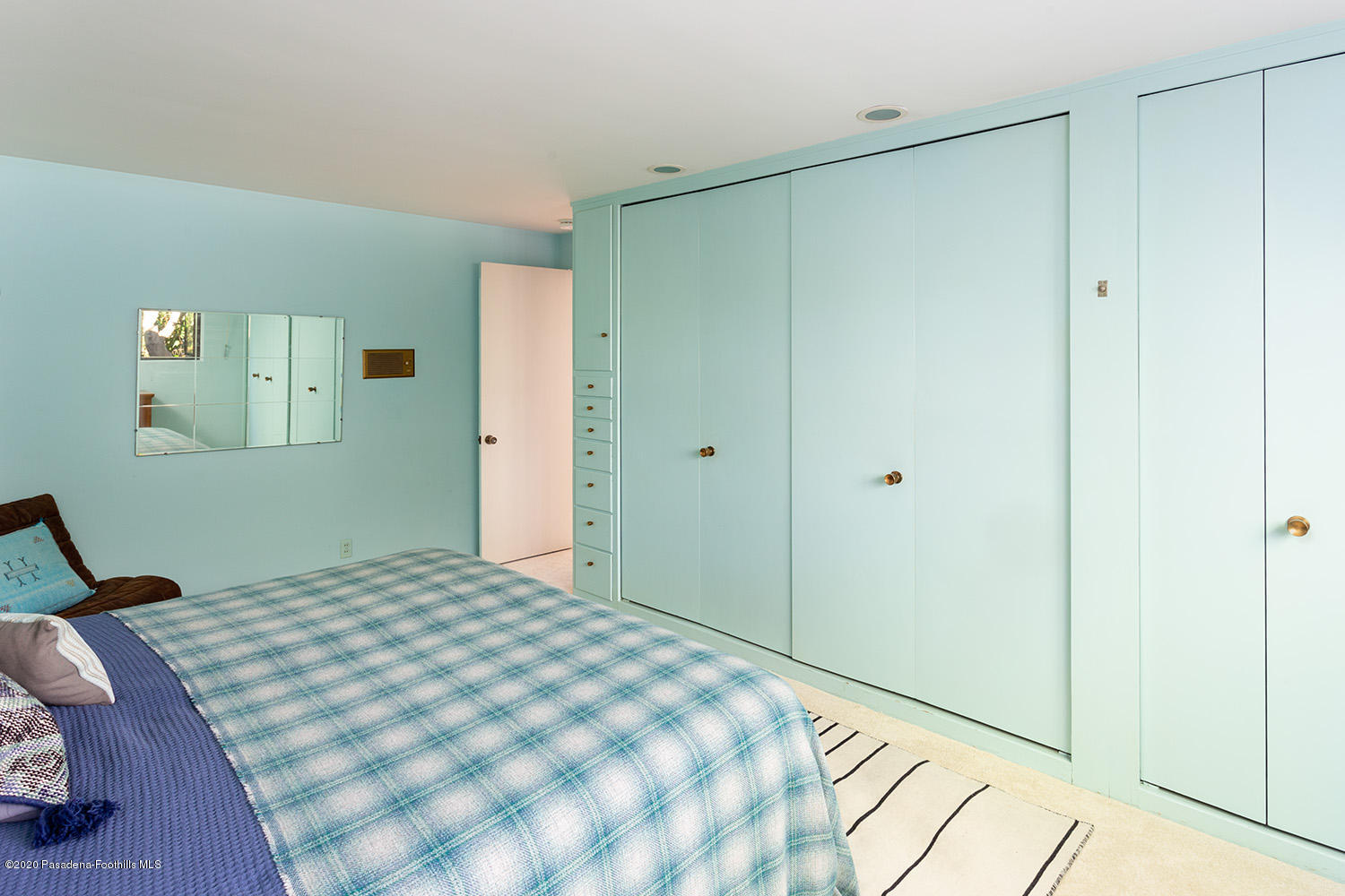 2105 Villa Heights Road Pasadena, CA 91107 - Photo 32 of 45 a bedroom with a bed and a mirror