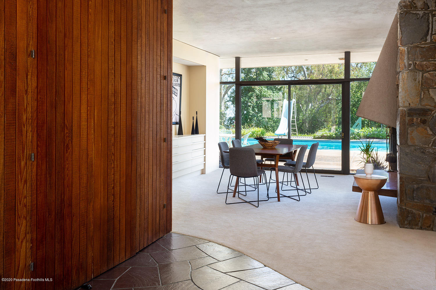 2105 Villa Heights Road Pasadena, CA 91107 - Photo 7 of 45 a dining room with furniture and a floor to ceiling window