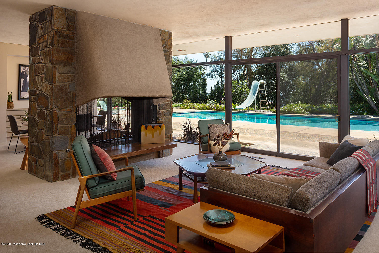 2105 Villa Heights Road Pasadena, CA 91107 - Photo 8 of 45 a building outdoor space with patio furniture and glass door