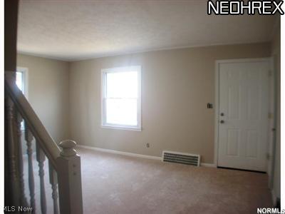 20906 Watson Road Maple Heights, OH 44137 - Photo 2 of 19 Living Room (Brand New Carpet) w/Open Staircase
