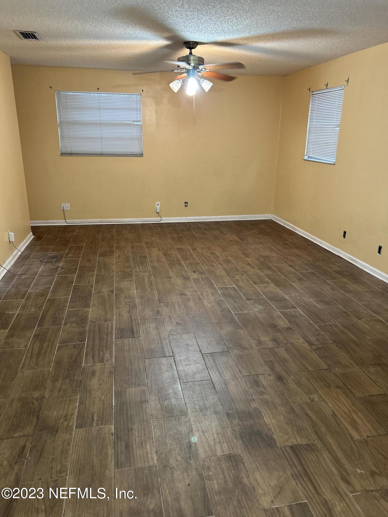 3733 Spring Lake Road Jacksonville, FL 32210 - Photo 3 of 7 a view of an empty room