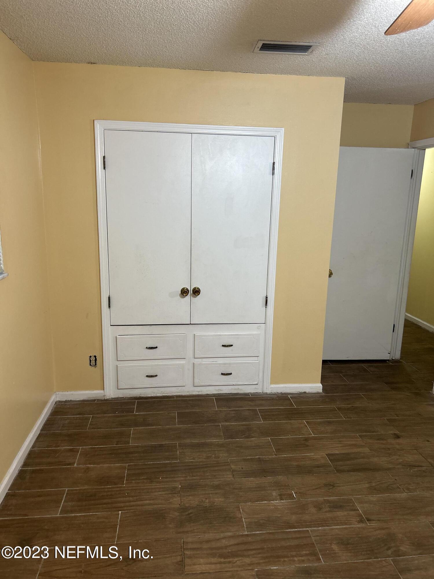 3733 Spring Lake Road Jacksonville, FL 32210 - Photo 6 of 7 a view of an empty room