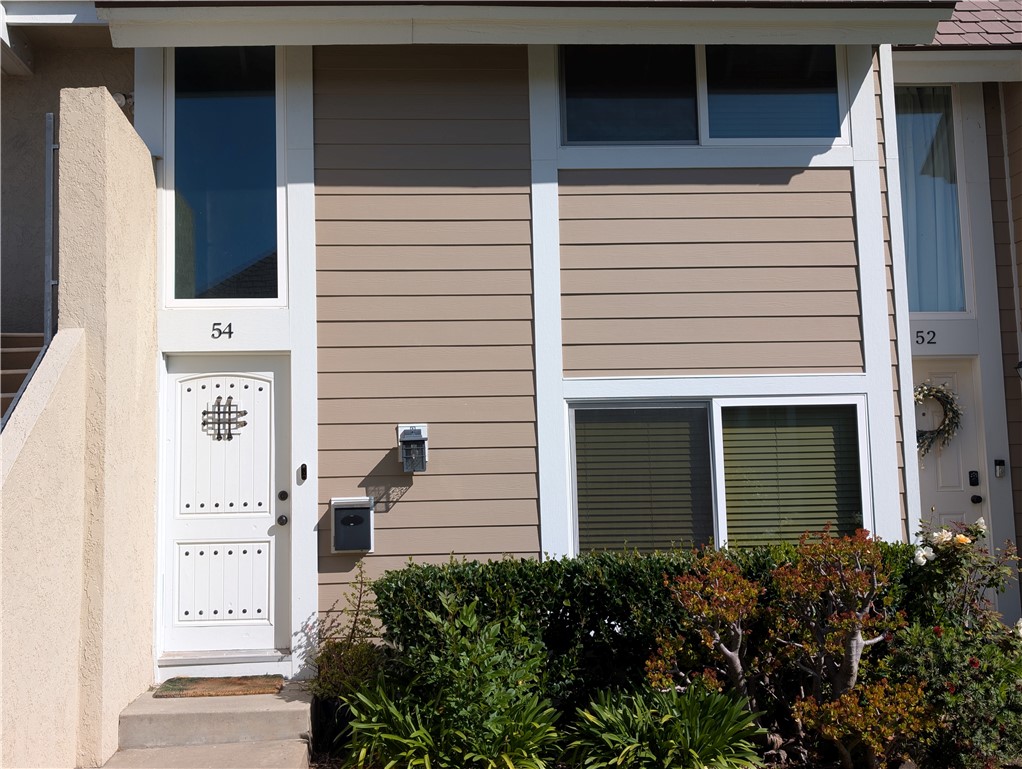 54 Oval Road, Unit 3 Irvine, CA 92604 - Photo 1 of 36 a view of a door of the house