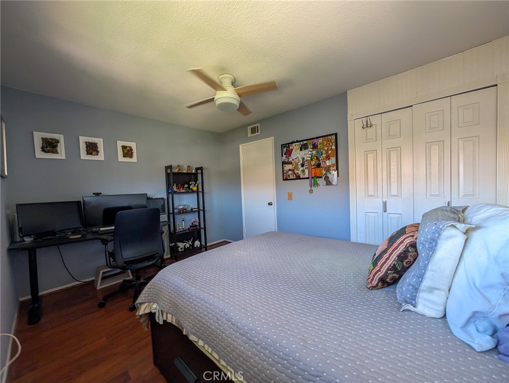 54 Oval Road, Unit 3 Irvine, CA 92604 - Photo 19 of 36 a bedroom with a bed and a desk