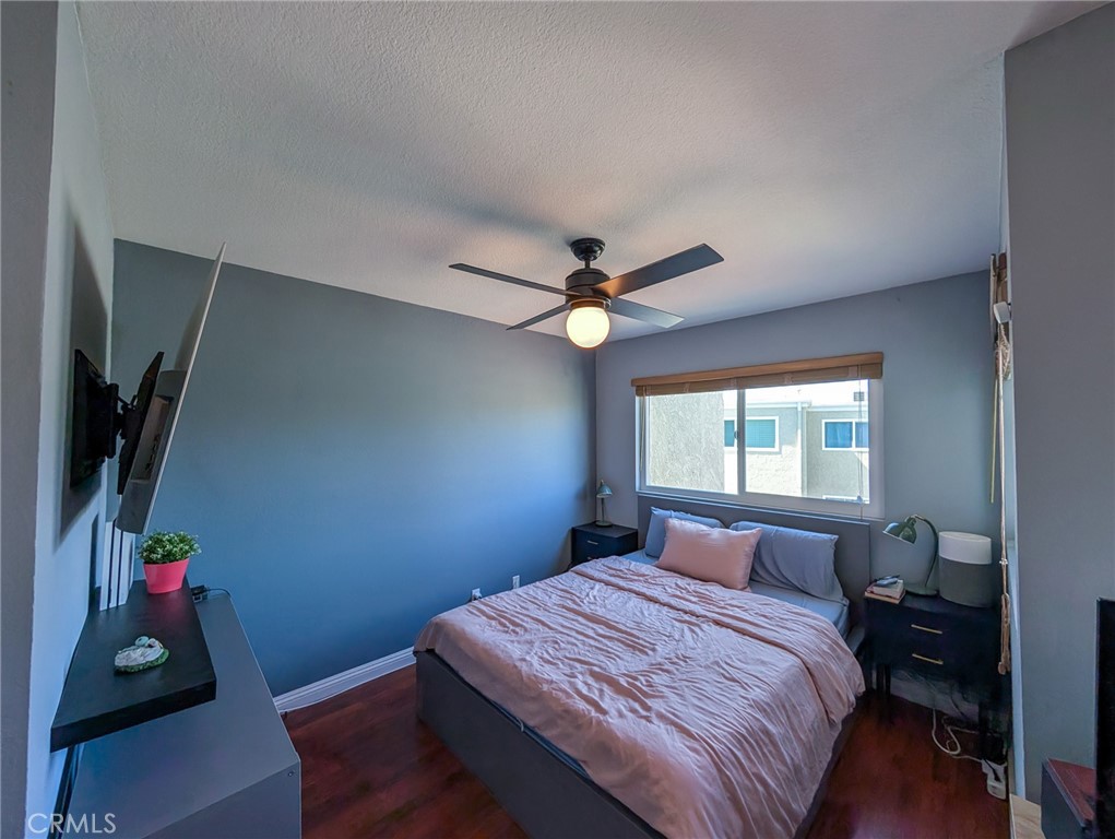 54 Oval Road, Unit 3 Irvine, CA 92604 - Photo 21 of 36 a bedroom with a bed and a window