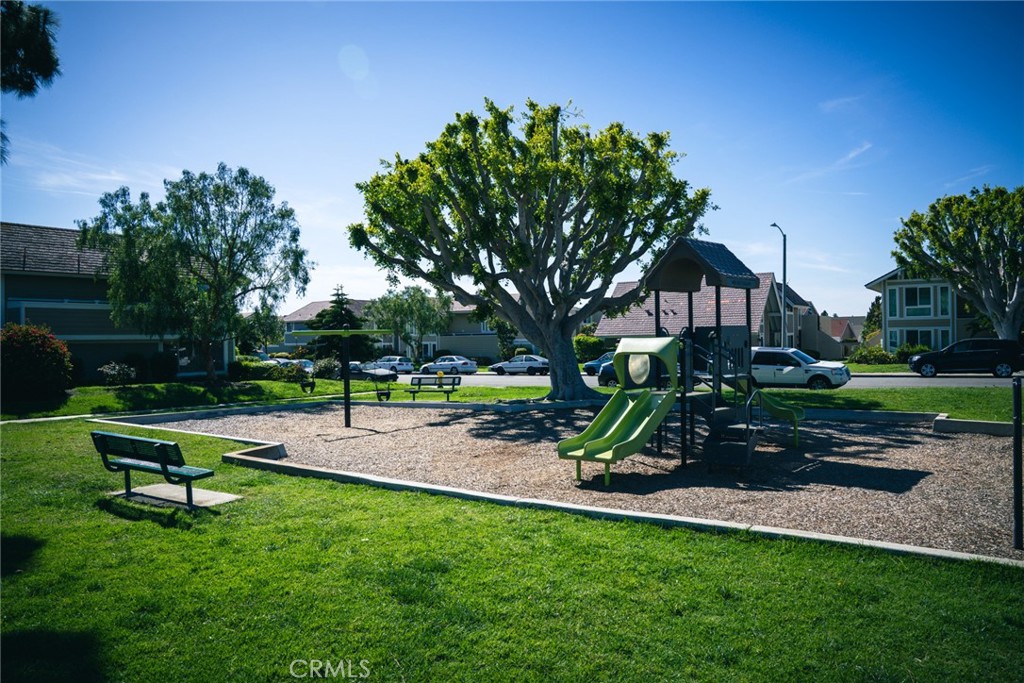 54 Oval Road, Unit 3 Irvine, CA 92604 - Photo 34 of 36 a view of a park with swings and slides