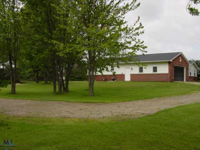 361 West Galbraith Line Road Melvin, MI 48454 - Photo 20 of 28 This is a side view of the attached garage.
