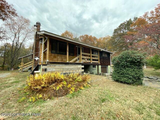 613 George Place Bushkill, PA 18324 - Photo 1 of 23 a view of house with backyard