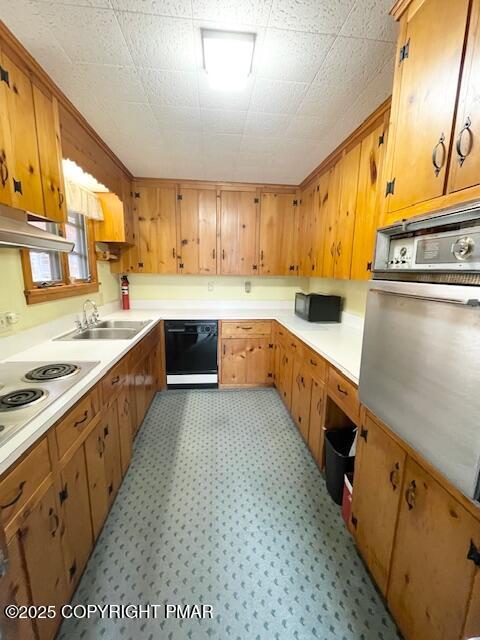 613 George Place Bushkill, PA 18324 - Photo 8 of 23 a large kitchen with stainless steel appliances granite countertop a stove a sink dishwasher and cabinets with wooden floor