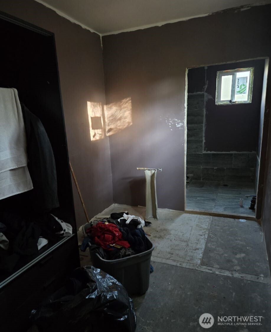 18820 220th Avenue Southeast Maple Valley, WA 98038 - Photo 12 of 16 a bathroom with a sink and a mirror