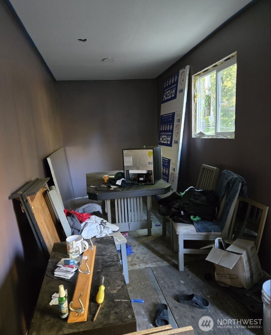18820 220th Avenue Southeast Maple Valley, WA 98038 - Photo 10 of 16 a bedroom with furniture and a window
