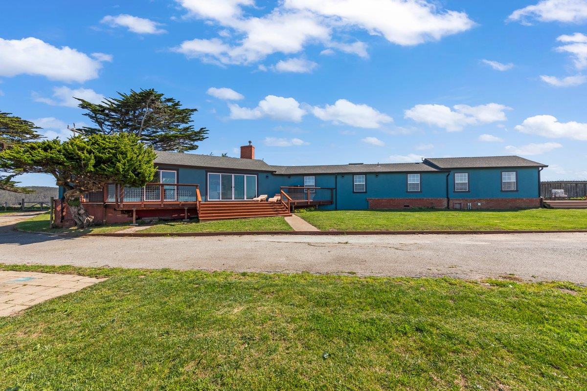 1263 Reservoir Road Pescadero, CA 94060 - Photo 17 of 75 a view of swimming pool with outdoor seating and house in the background