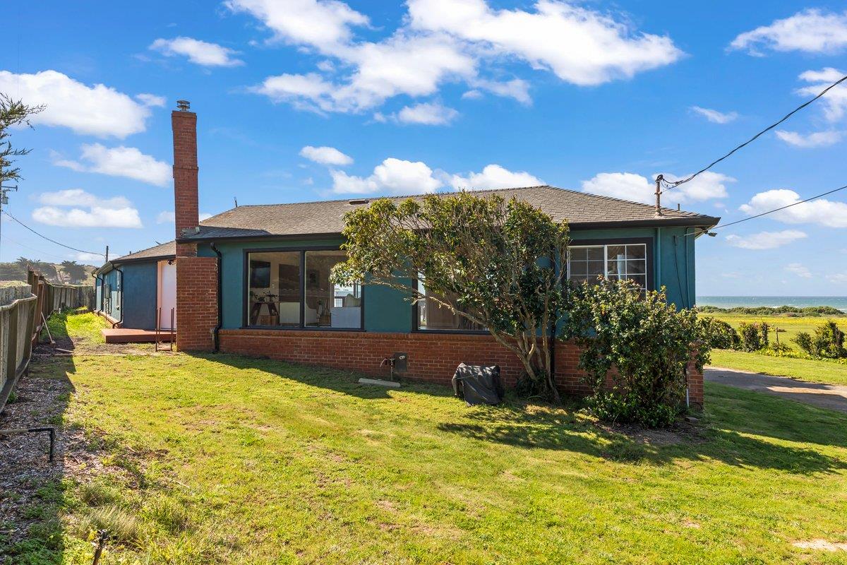 1263 Reservoir Road Pescadero, CA 94060 - Photo 20 of 75 a view of a house with swimming pool and yard