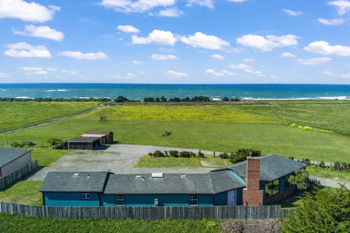1263 Reservoir Road Pescadero, CA 94060 - Photo 2 of 75 a view of a city with an ocean