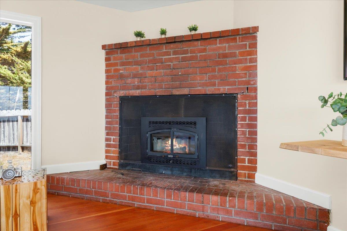 1263 Reservoir Road Pescadero, CA 94060 - Photo 34 of 75 a living room with a fireplace