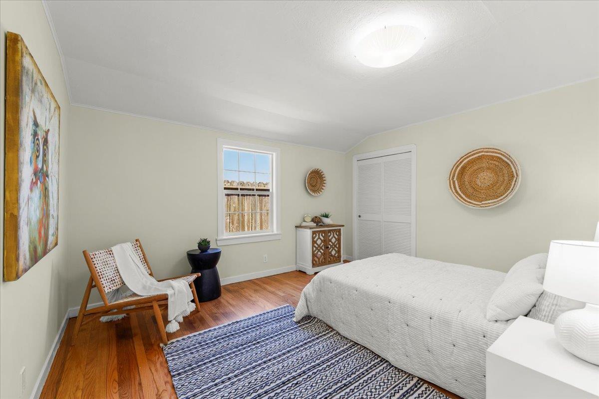 1263 Reservoir Road Pescadero, CA 94060 - Photo 51 of 75 a bedroom with a bed and dresser
