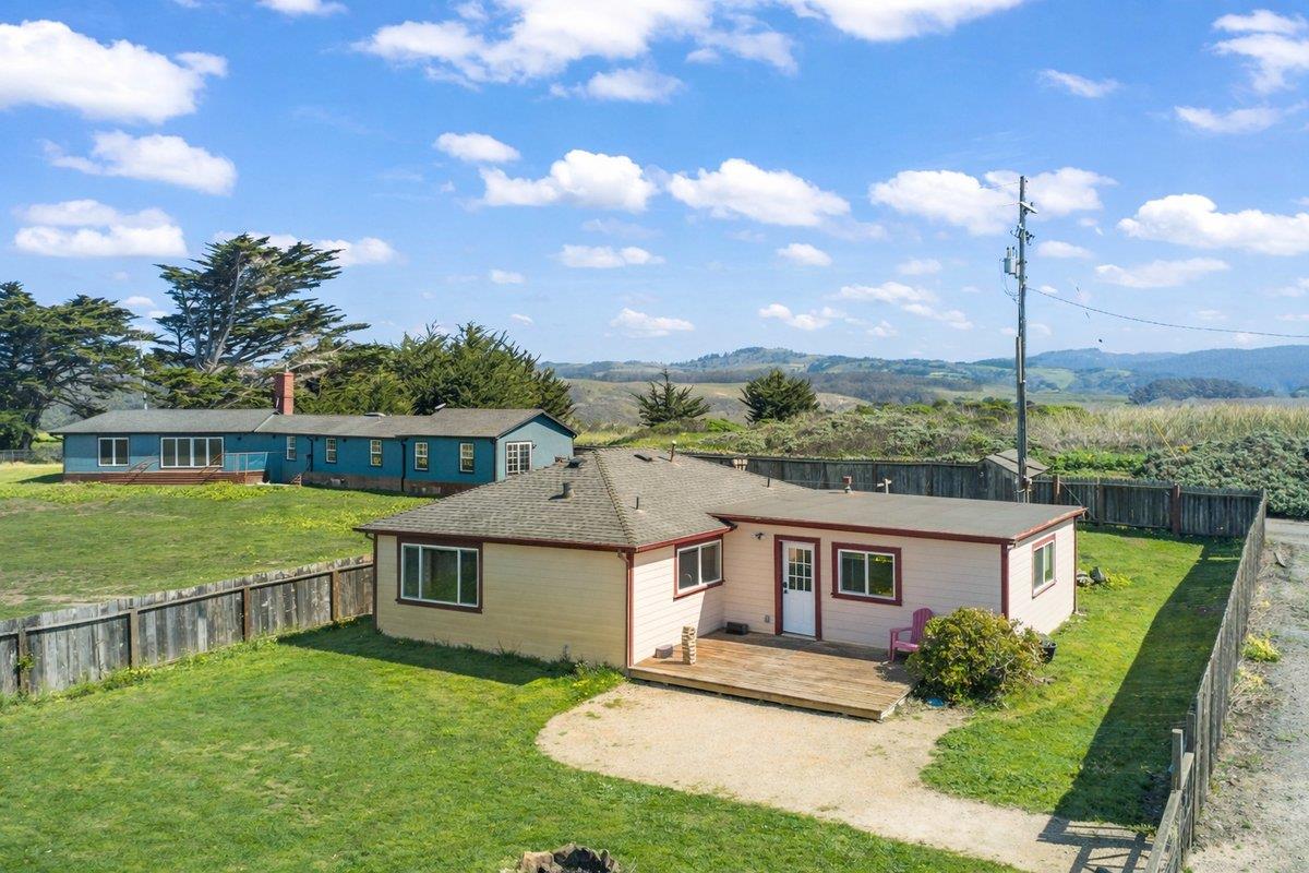 1263 Reservoir Road Pescadero, CA 94060 - Photo 56 of 75 a front view of a house with a yard