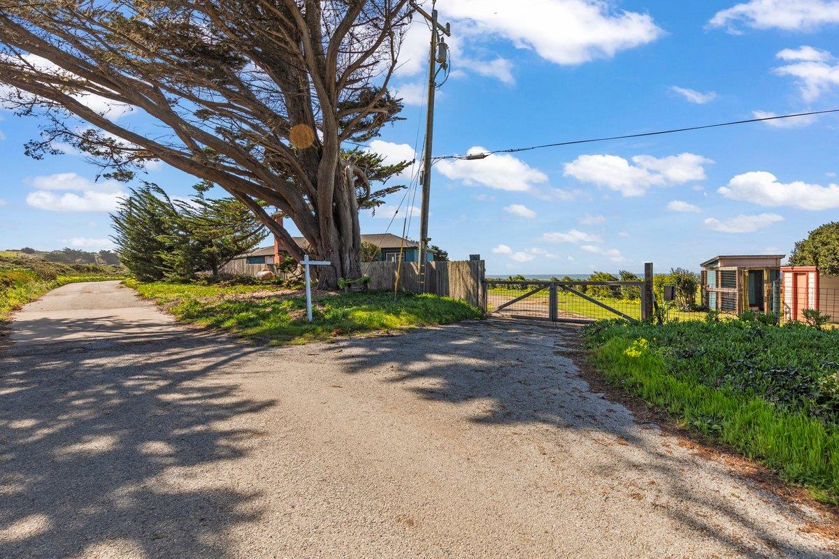 1263 Reservoir Road Pescadero, CA 94060 - Photo 7 of 75 a view of a street with a building in the background