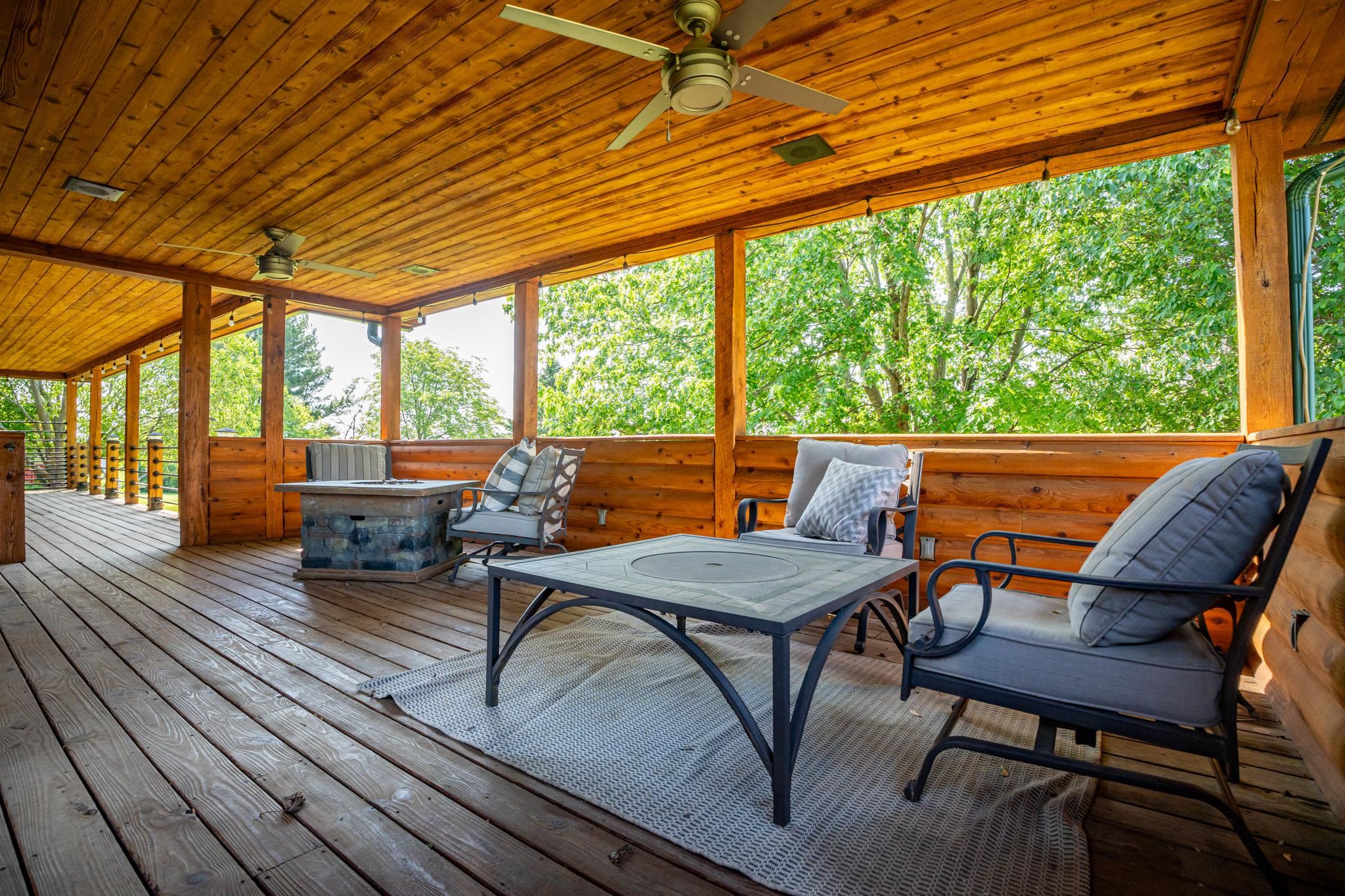 14742 Best Road Davis, IL 61019 - Photo 54 of 84 a view of a patio with wooden floor and outdoor seating