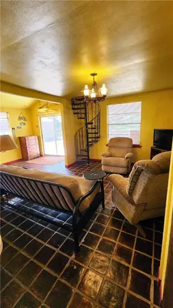 a view of balcony with furniture