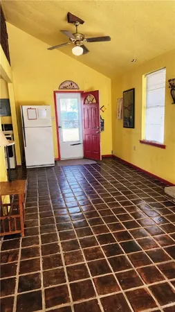 a large white building with a canopy over it