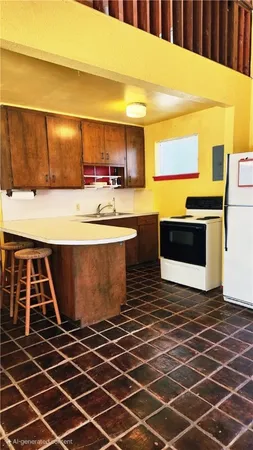 a bathroom with a toilet a sink and a shower