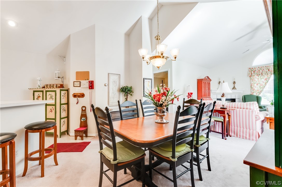 1329 Tannery Circle Midlothian, VA 23113 - Photo 16 of 35 a view of a dining room with furniture and a potted plant