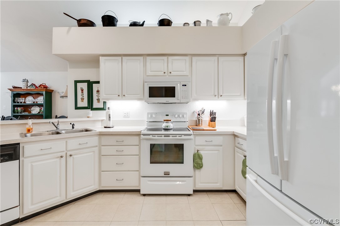 1329 Tannery Circle Midlothian, VA 23113 - Photo 21 of 35 a kitchen with white cabinets and white appliances
