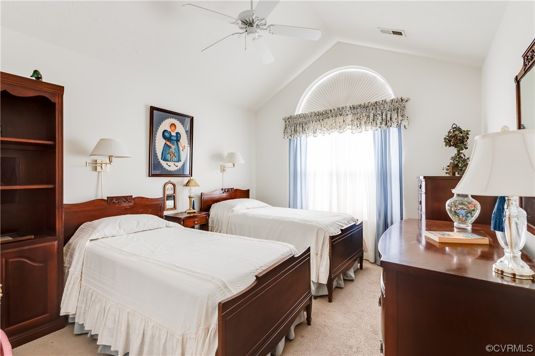 1329 Tannery Circle Midlothian, VA 23113 - Photo 28 of 35 a bedroom with two beds and a chandelier