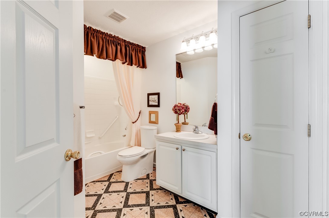 1329 Tannery Circle Midlothian, VA 23113 - Photo 29 of 35 a bathroom with a sink a toilet and shower