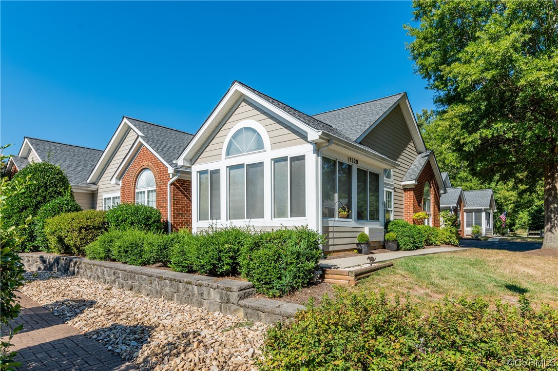 1329 Tannery Circle Midlothian, VA 23113 - Photo 3 of 35 a front view of a house with a yard