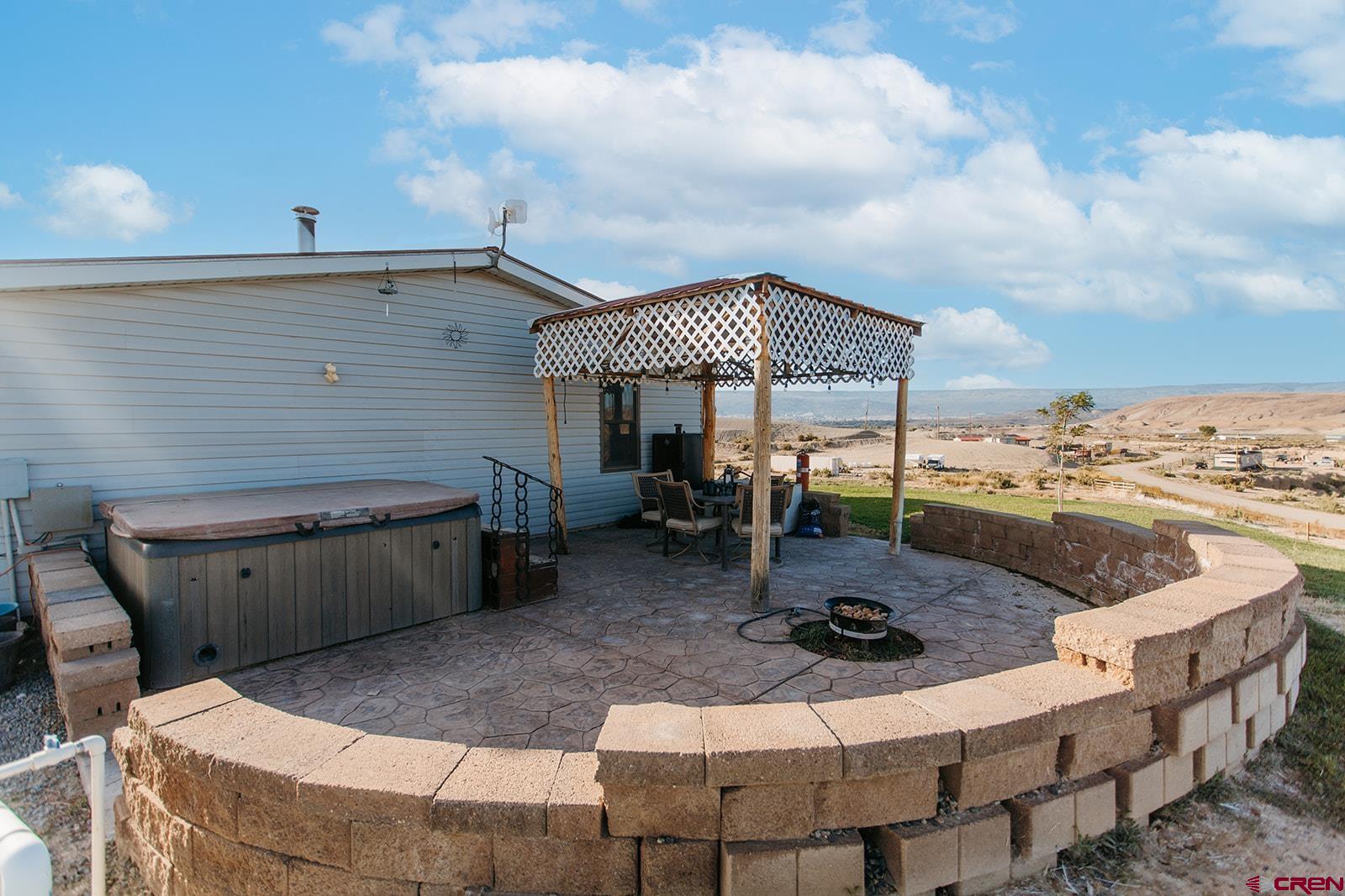 5697 Peach Valley Road Delta, CO 81416 - Photo 27 of 31 a view of a house with backyard