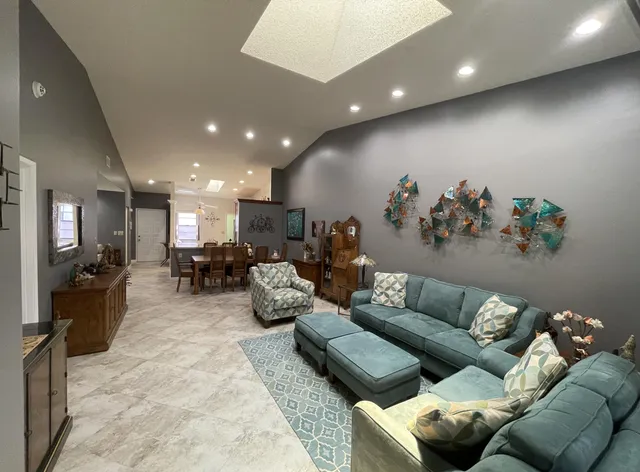 a living room with furniture and a couch