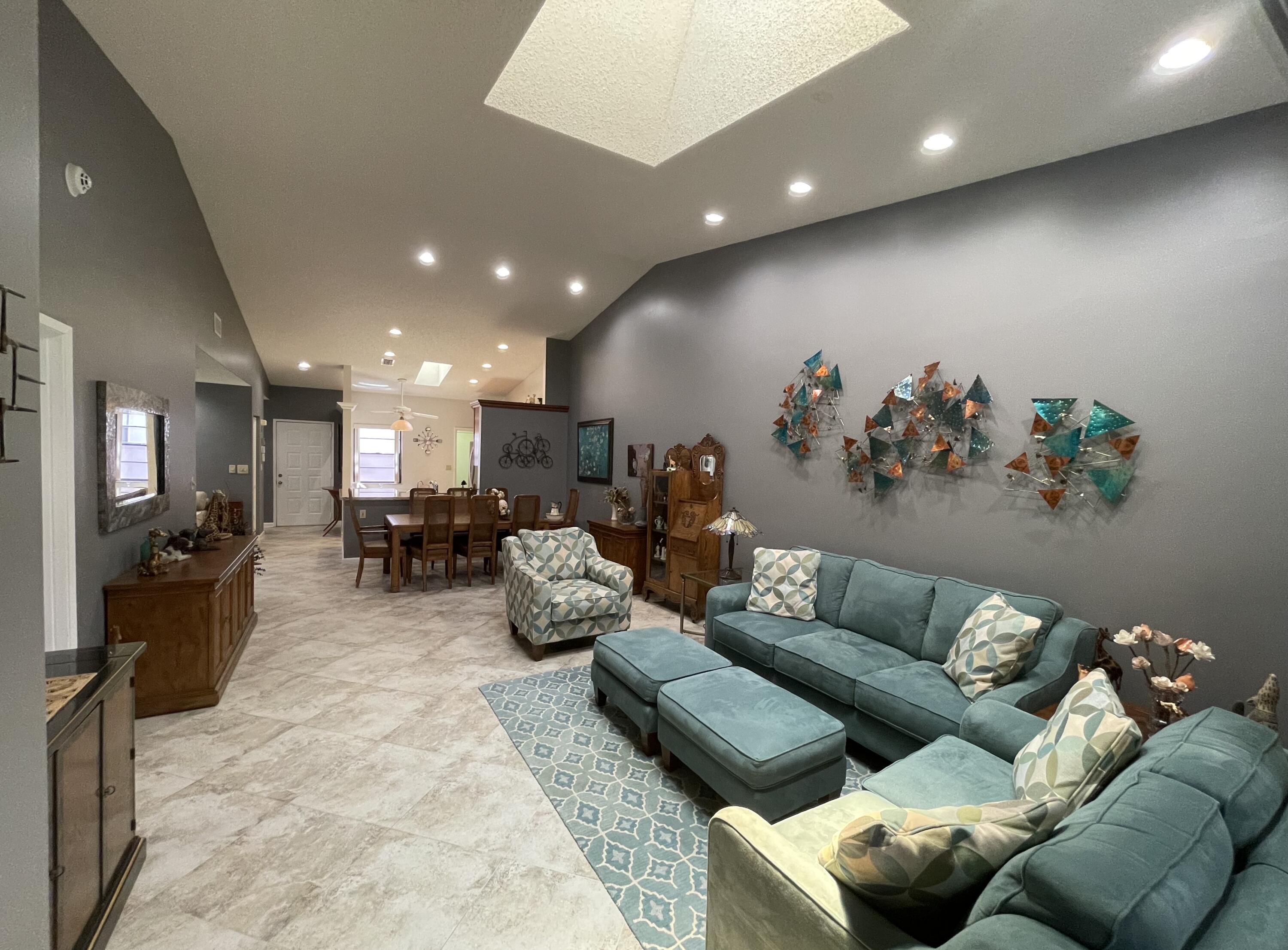 6141 Sunny Pointe Circle, Unit B Delray Beach, FL 33484 - Photo 12 of 62 a living room with furniture and a couch