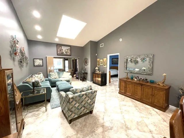 a living room with furniture and a couch