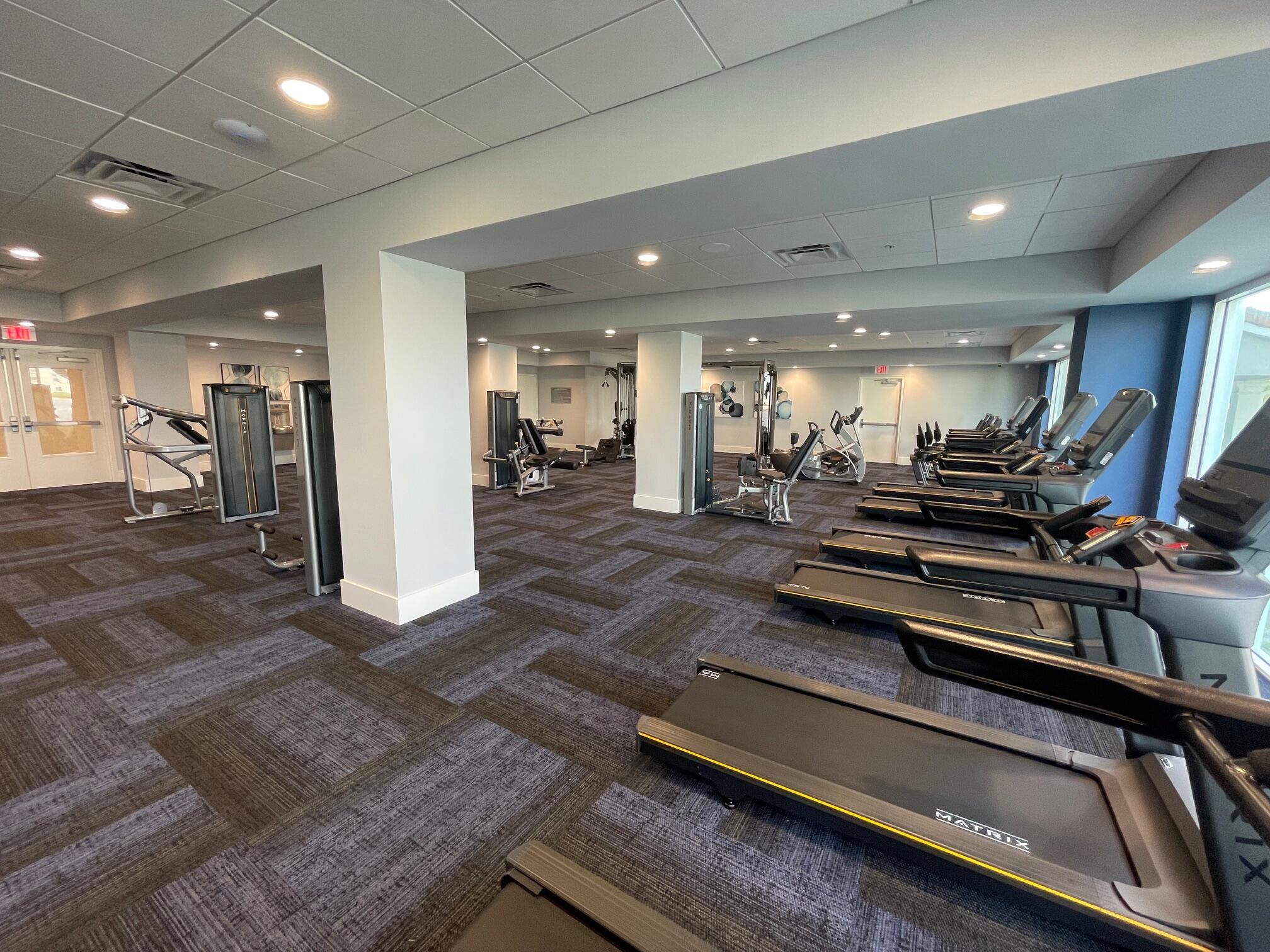 6141 Sunny Pointe Circle, Unit B Delray Beach, FL 33484 - Photo 39 of 62 a view of a room with gym equipment
